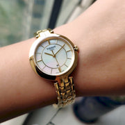 Tissot Flamingo Mother of Pearl White Dial Gold Steel Strap Watch For Women - T094.210.33.111.00