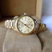 Burberry The Classic Champagne Gold Dial Gold Steel Strap Watch for Women - BU10109