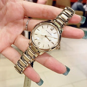 Burberry The Classic Champagne Gold Dial Gold Steel Strap Watch for Women - BU10109
