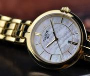 Tissot Flamingo Mother of Pearl White Dial Gold Steel Strap Watch For Women - T094.210.33.111.00