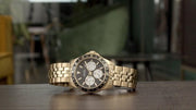 Guess Odyssey Multifunction Black Dial Gold Steel Strap Watch For Men - W1107G4