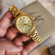 Burberry The Classic Champagne Gold Dial Gold Steel Strap Watch for Women - BU10109