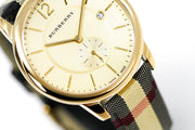 Burberry The Classic Round Gold Dial Brown Leather Strap Unisex Watch  - BU10001