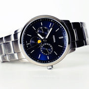 Fossil Neutra Minimalist Moonphase Blue Dial Silver Steel Strap Watch for Men - FS5907