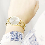 Calvin Klein Stately Silver Dial Gold Steel Strap Watch for Women - K3G23526