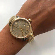 Burberry The Classic Champagne Gold Dial Gold Steel Strap Watch for Women - BU10109