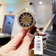 Guess Night Life Diamonds Black Dial Gold Steel Strap Watch for Women - GW0405L2