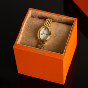 Tory Burch Oval White Dial Gold Steel Strap Watch for Women - TBW6032