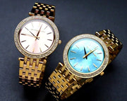 Michael Kors Darci Analog Mother of Pearl Green Dial Gold Steel Strap Watch For Women - MK3498